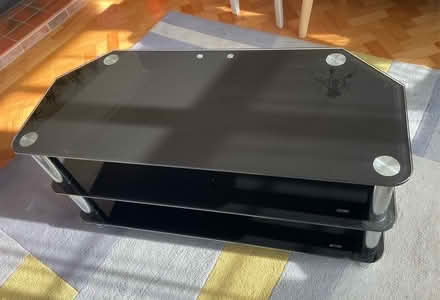 Photo of free Black glass TV stand (Widford CM1) #1