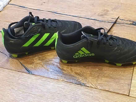 Photo of free Football shoes blk/grn size 2 studs (High Barnet) #2