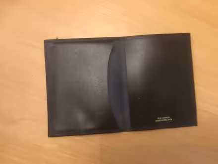 Photo of free Black leather passport holder (B62 near Blackheath) #2