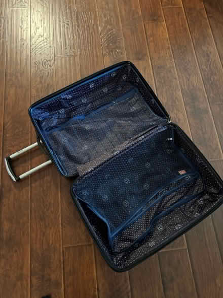 Photo of free Large black suitcase (Mid City / Koreatown) #4
