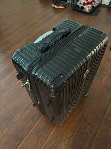 Photo of free Large black suitcase (Mid City / Koreatown) #1