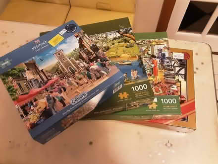 Photo of free 4 x 1000 piece puzzles (Ashurst Wood RH19) #1