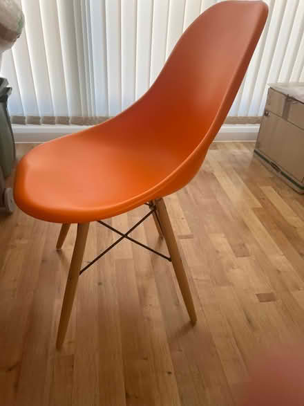 Photo of free Orange plastic chair wooden legs (St John’s Wood NW8) #1