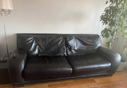 Photo of free Large brown leather sofa from DFS (St Julians AL1) #1