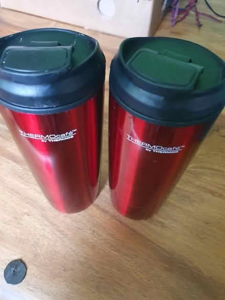 Photo of free 2 red travel mugs, virtually new, but ineffective (Hungerford RG17) #1