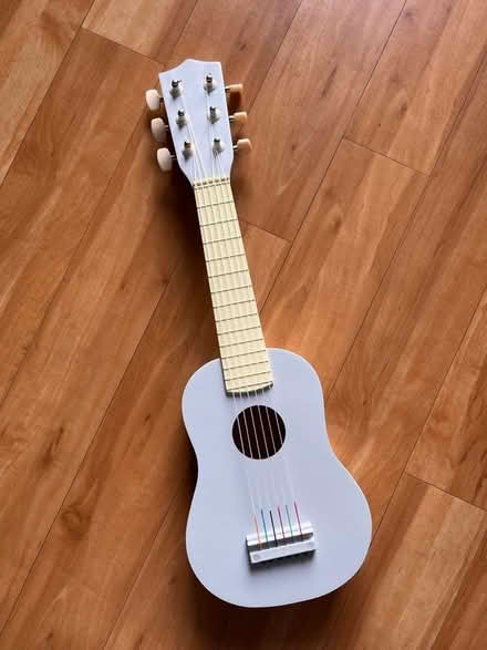 Photo of free Toy guitar for small children (brand new boxed) (Woking GU22) #1