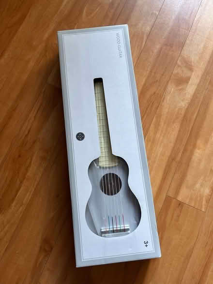 Photo of free Toy guitar for small children (brand new boxed) (Woking GU22) #2