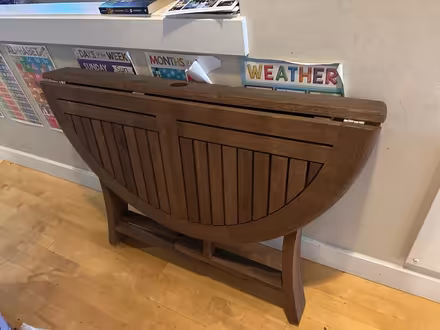 Photo of free Round Teak Folding Table (Cap Hill) #2