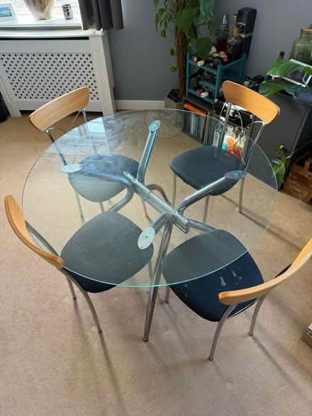Photo of free Glass table and four chairs (Lichfield WS14) #3