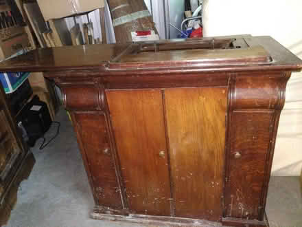Photo of free Treadle sewing machine in wooden cabinet (Grayrigg LA8) #2