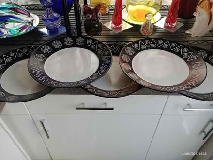 Photo of free Five large black and beige plates (Dogsthorpe) #1