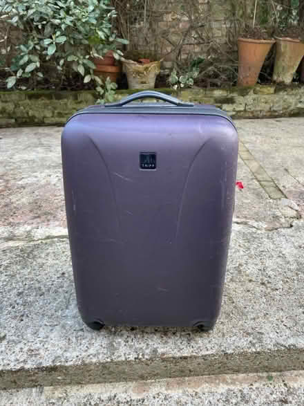 Photo of free Large Purple Tripp Suitcase (Islington N5) #1