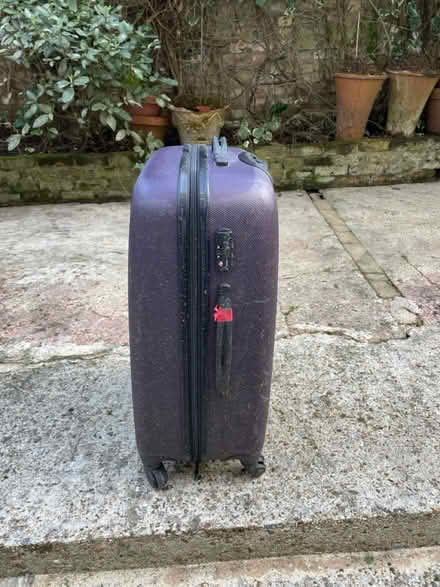 Photo of free Large Purple Tripp Suitcase (Islington N5) #2