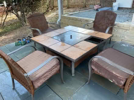 Photo of free Patio table w/fire pit and 4 chairs (Four Corners) #1