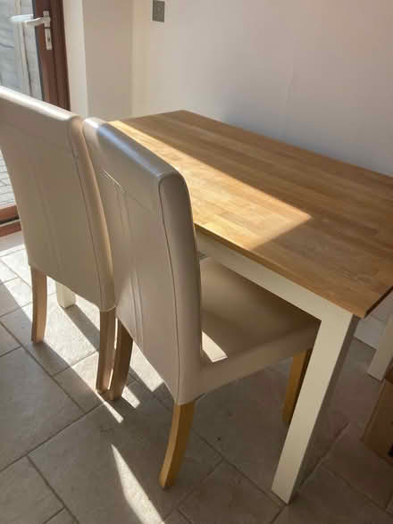 Photo of free Dining table + 4 chairs (GU22) #1
