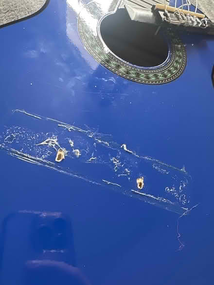 Photo of free Broken children’s guitar (Weybridge) #2