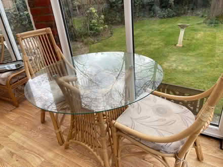 Photo of free Cane glass topped table and 4 chairs ideal for conservatory (Cockfosters EN4) #1