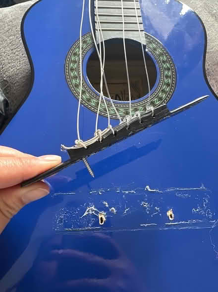 Photo of free Broken children’s guitar (Weybridge) #3
