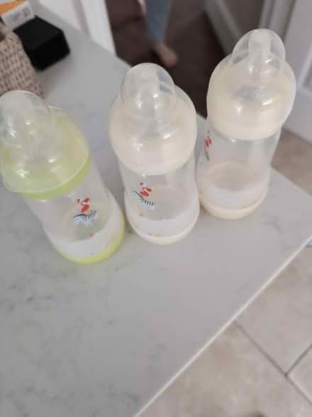 Photo of free Large MAM baby milk bottles (Weybridge) #1