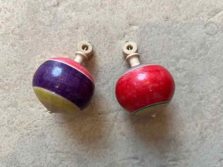 Photo of free A pair of wooden spinning toys (City College area NR1) #1