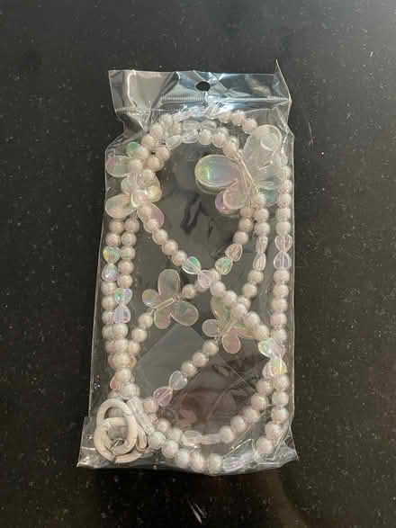 Photo of free Cell phone cross body strap (U street) #1