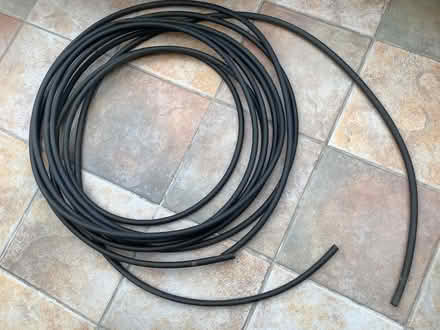 Photo of free Narrow black rubber greenhouse piping (Deanburn EH26) #1