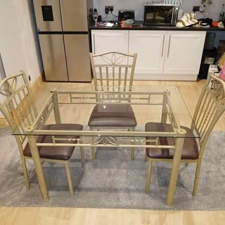 Photo of free Glass table & 4 chairs (Common Edge FY4) #1