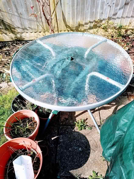 Photo of free Small glass garden table with parasol hole (Pin Green SG2) #1