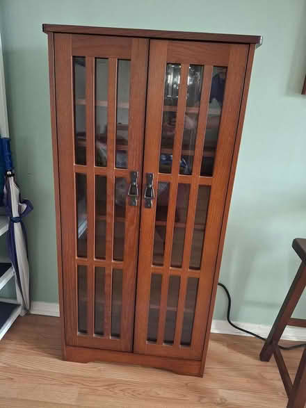 Photo of free Curb alert: wooden dvd cabinet (Woodridge (75th & Janes)) #1