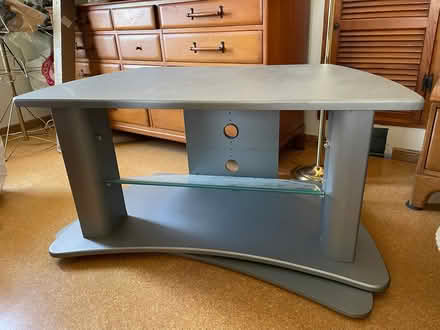 Photo of free Corner TV Stand w/ glass selves (2) (Rutgers Village, New Brunswick) #1