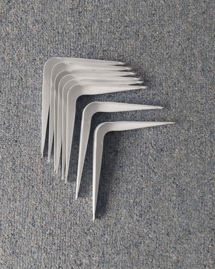Photo of free White painted pressed steel brackets (GU51) #1