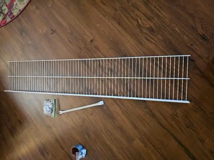 Photo of free 65" x 12" Rubbermaid shelf (Ashburn) #1