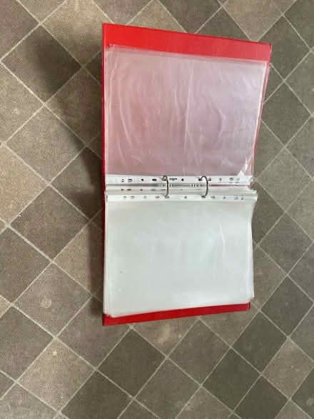Photo of free Ring binder and about 70 plastic A4 punched pockets (Stretham CB6) #1