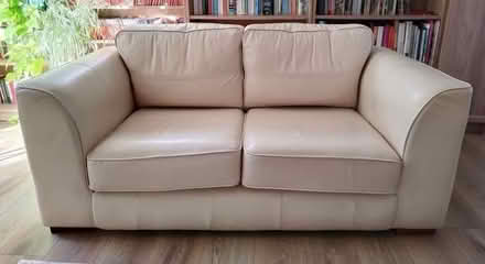 Photo of free Cream leather two seat sofa (Carshalton SM5) #1