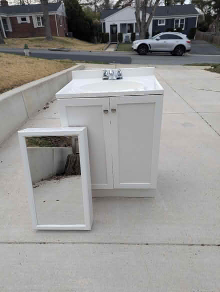 Photo of free Glacier Bay Vanity, Sink, Cabinet (Wells Prkway and Gumwood Dr) #1