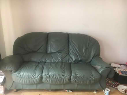 Photo of free Two green leather sofas (Woking) #1