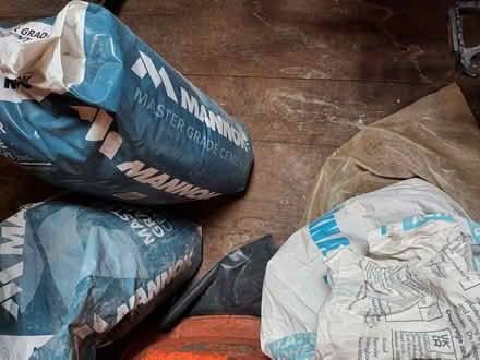 Photo of free Cement. One full bag, one opened and some adhesive some (Old Road OX3) #1