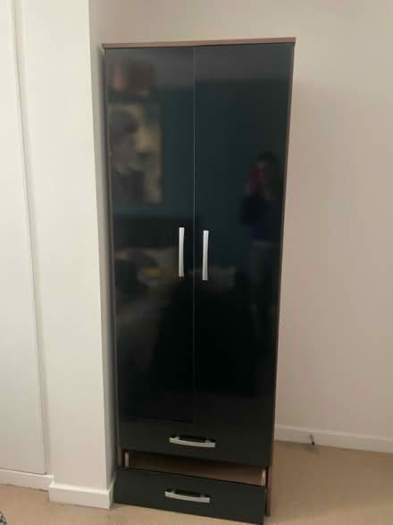 Photo of free Black wooden slimline wardrobe (E14) #1