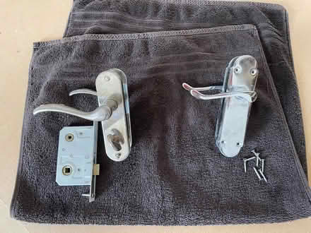 Photo of free 2 pairs of silver door handles (one with lock mechanism) (Stretham CB6) #1