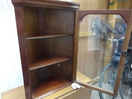 Photo of free Wooden corner cabinet with glass door (Rushwick WR2) #1