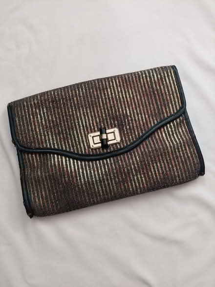 Photo of free Black and gold clutch (near Ilchester Elementary) #1