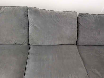 Photo of free Grey L-shaped sofa and footstool (Biggleswade SG18) #2