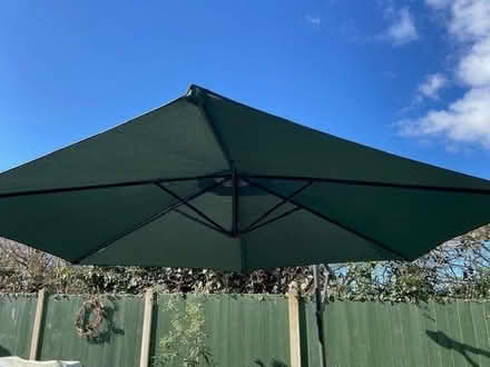 Photo of free Large green outdoor parasol and base (Simonstone BB12) #1