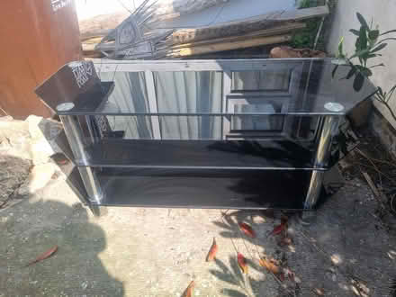 Photo of free Black glass tv unit (Stone Cross BN23) #1