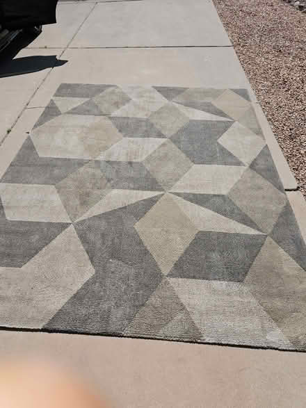 Photo of free 8x10 rugs (Near Unser and southern) #1