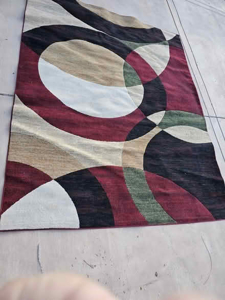 Photo of free 8x10 rugs (Near Unser and southern) #2