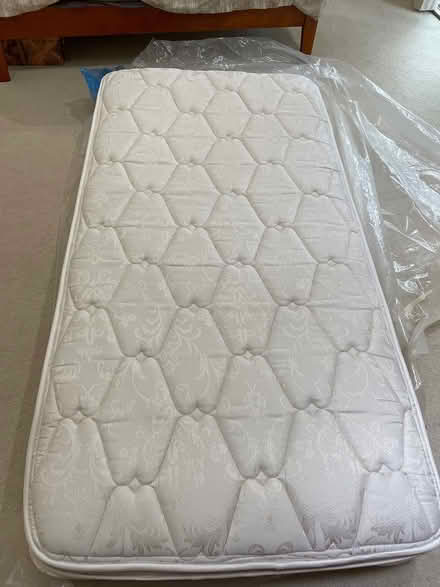 Photo of free Twin mattress - barely used (Tigard) #1