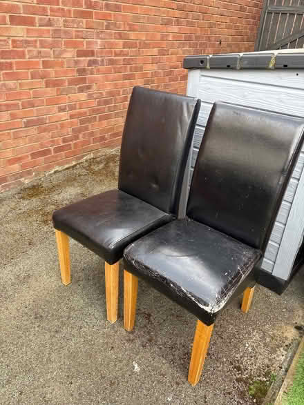 Photo of free 2 black faux leather dining chairs (Sutton farm) #1