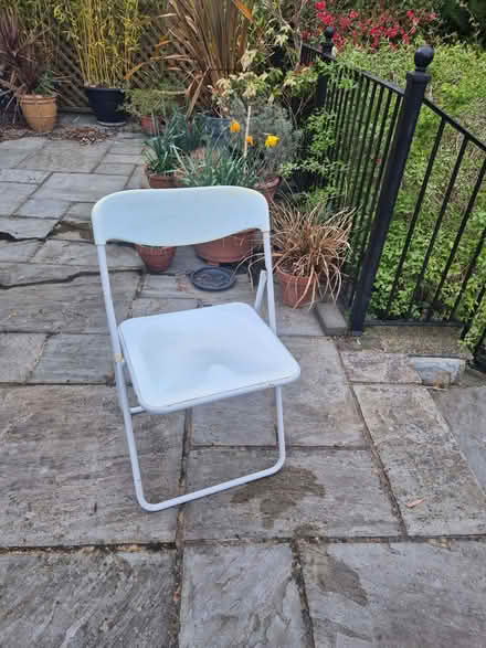 Photo of free 4 white folding chairs (Romford RM1) #1