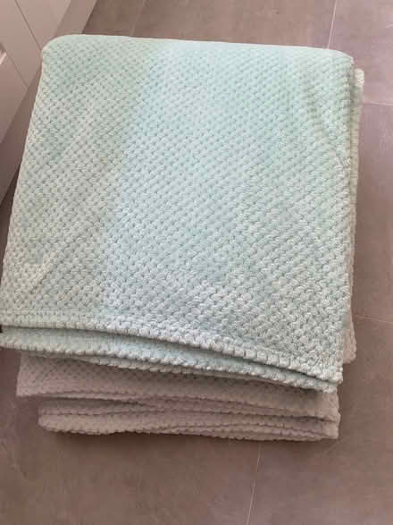 Photo of free XL mint green cosy throws x 3 (Fulham Palace Rd SW6) #2
